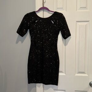 Mini black sequin dress used but in great condition no rips or tears